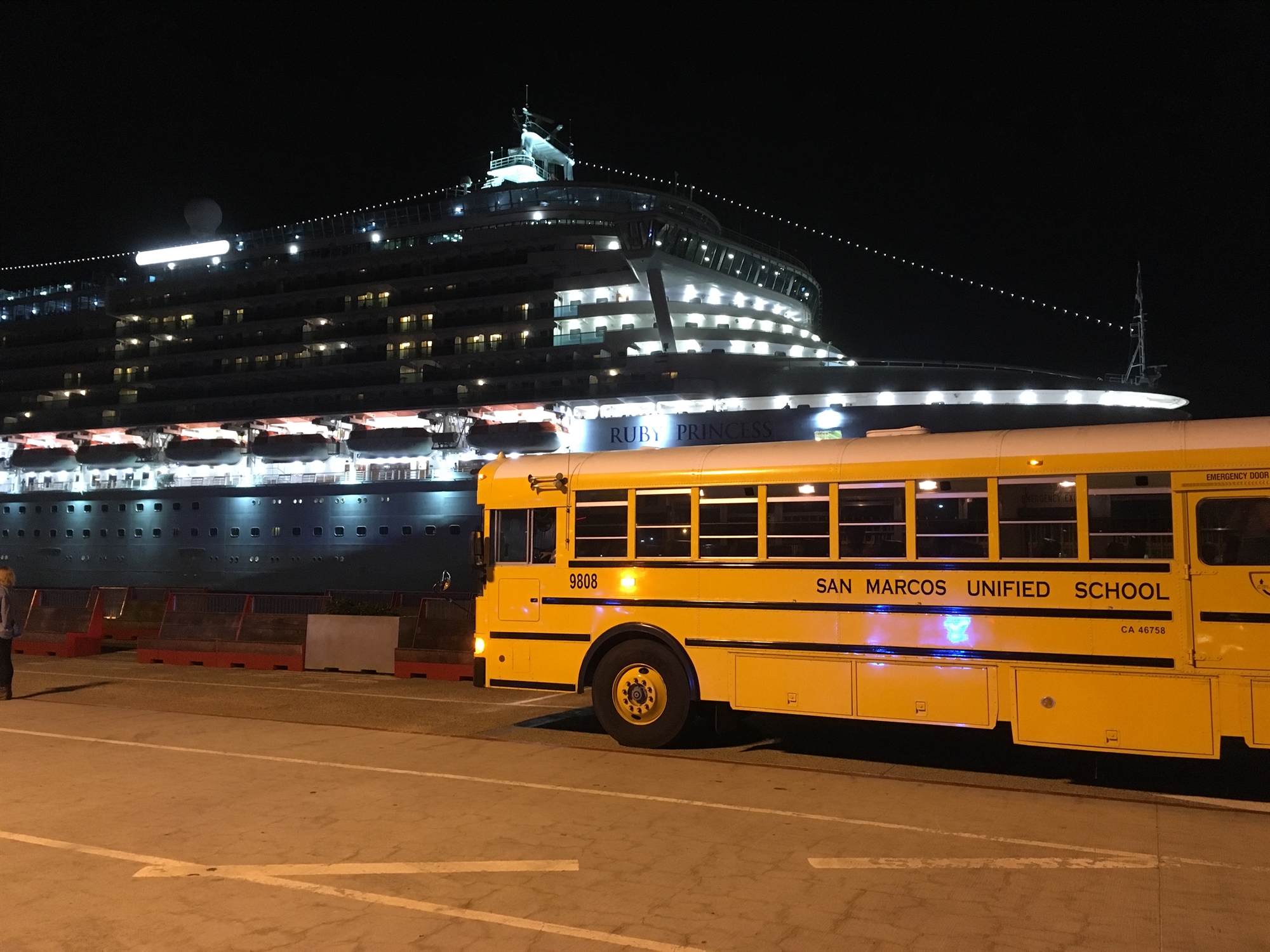 School Bus in front of Curise Ship
